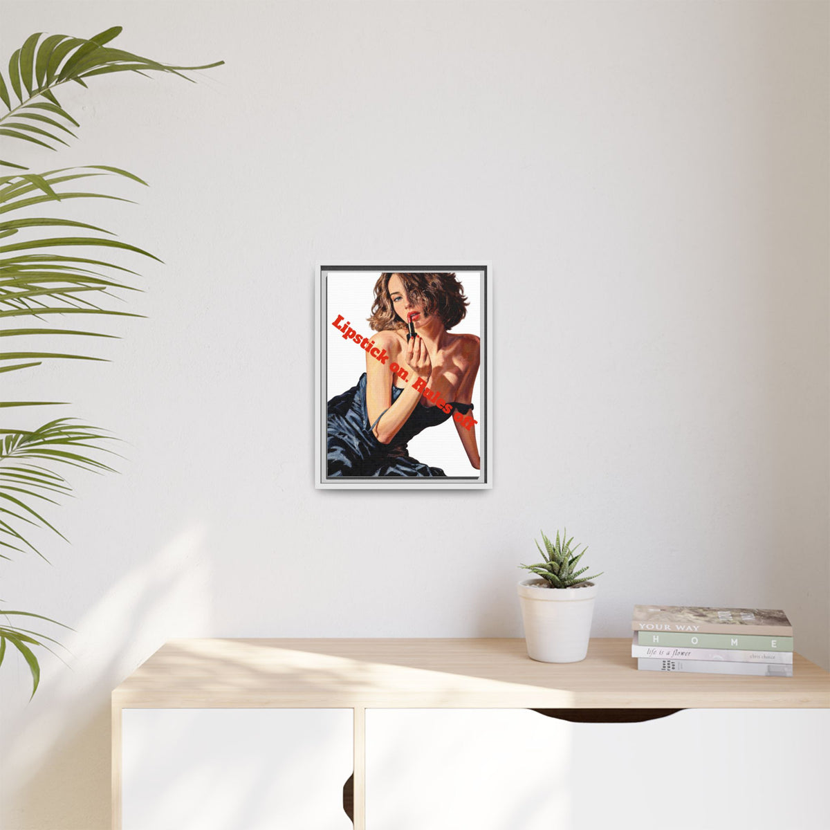 Framed canvas print showing colorful artwork and white frame